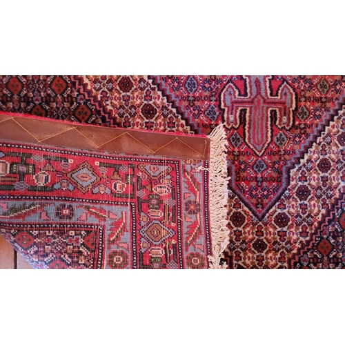 228 - A GOOD QUALITY SMALL PERSIAN TABRIZ RUG, with central medallion and multiple borders, a short white ... 