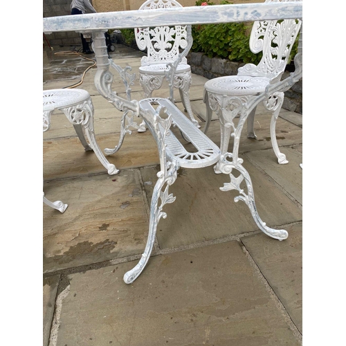 230 - A FINE WHITE CAST ALLOY GARDEN SET, to include an oval garden table with foliage decoration to under... 