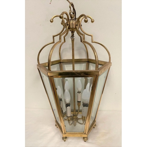 233 - A VINTAGE BRASS SIX SIDED LANTERN, c.1920, with bevelled glass, shaped body surrounding six branch c... 