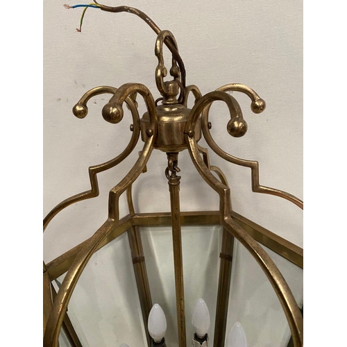 233 - A VINTAGE BRASS SIX SIDED LANTERN, c.1920, with bevelled glass, shaped body surrounding six branch c... 