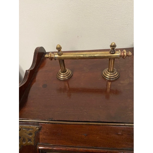 236 - A MAHOGANY SLOPE FRONT COAL BOX, with decorative brass panel engraved with floral design, brass moun... 