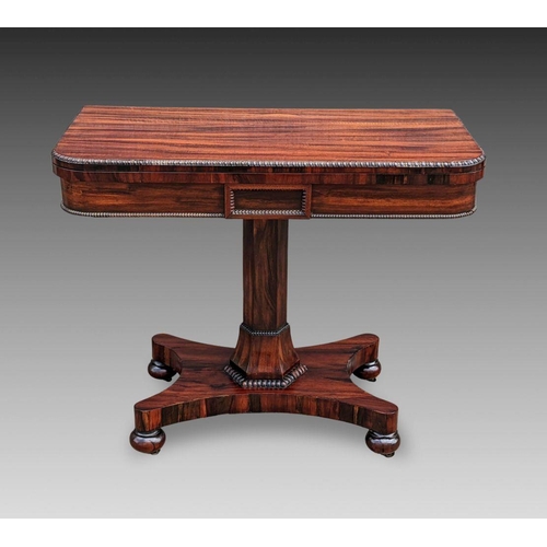 244 - A VERY FINE REGENCY ROSEWOOD FOLD OVER CARD TABLE, the rounded body decorated with gadrooned detail ... 