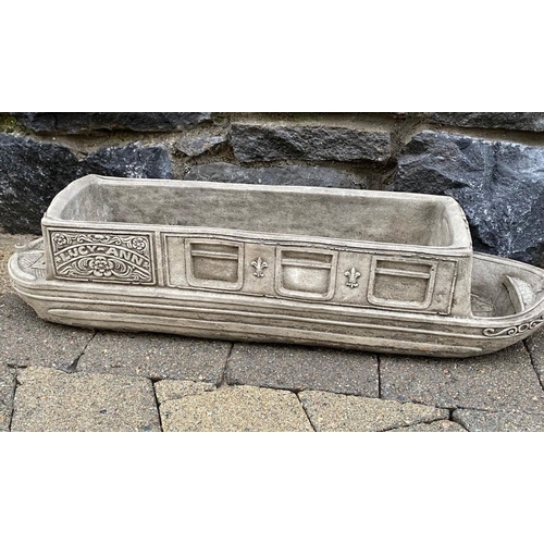 246 - A PAIR OF STONE GARDEN PLANTERS, in the form of boats, reading ‘Lucy Anne’ with floral designs to si... 