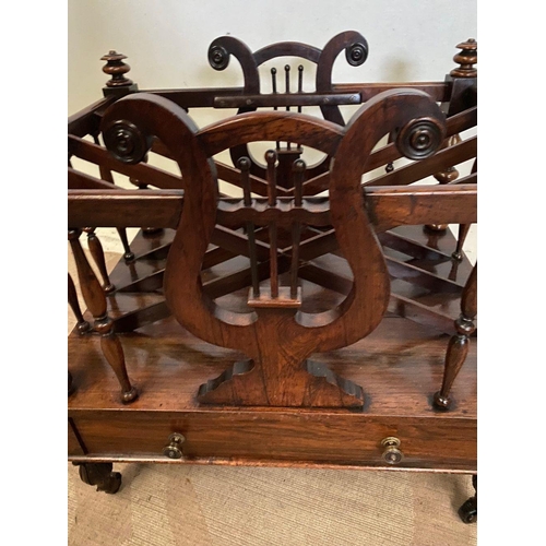 249 - AN EXCELLENT QUALITY ROSEWOOD REGENCY CANTERBURY, lyre-form, x-frame magazine holders, with turned s... 