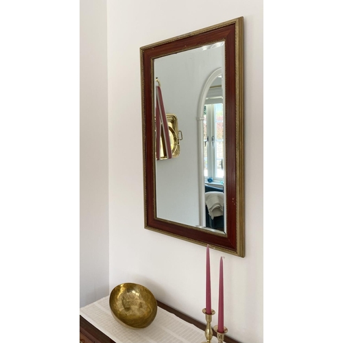 25 - A LOVELY ANTIQUE SWEDISH WALL MIRROR, rectangular form with bevelled glass within ornate deep red fr... 