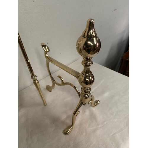 256 - A FINE SET OF THREE VICTORIAN POLISHED BRASS FIRE IRONS, with dogs, all with decorative finials, tur... 