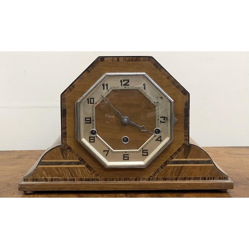 262 - AN ART DECO HARDWOOD INLAID MANTLE CLOCK, octagonal form with fine crossbanded details, on base with... 