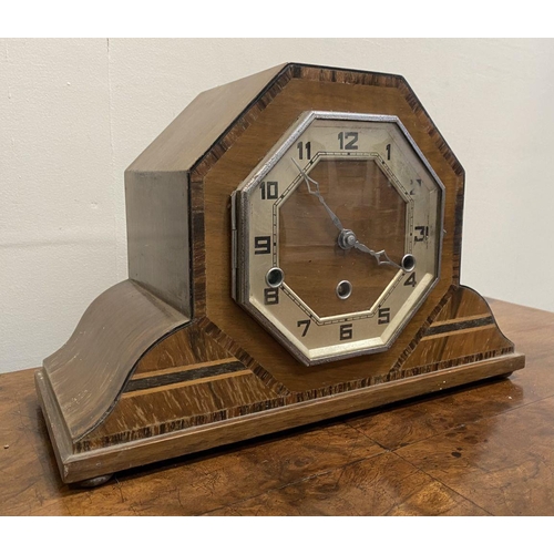 262 - AN ART DECO HARDWOOD INLAID MANTLE CLOCK, octagonal form with fine crossbanded details, on base with... 