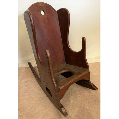 265 - AN RARE ANTIQUE IRISH PINE CHILDS ROCKING CHAIR, in very good condition.