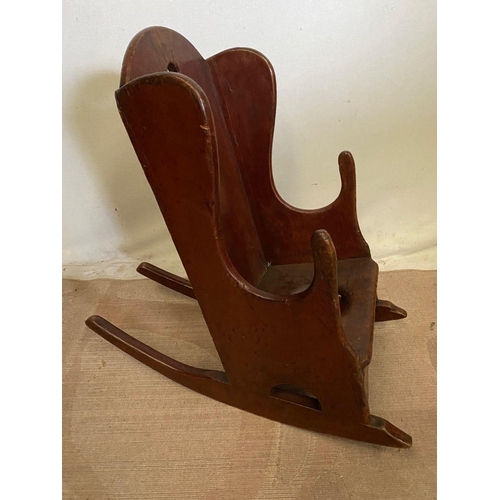 265 - AN RARE ANTIQUE IRISH PINE CHILDS ROCKING CHAIR, in very good condition.