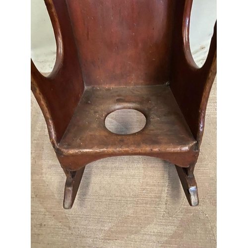 265 - AN RARE ANTIQUE IRISH PINE CHILDS ROCKING CHAIR, in very good condition.