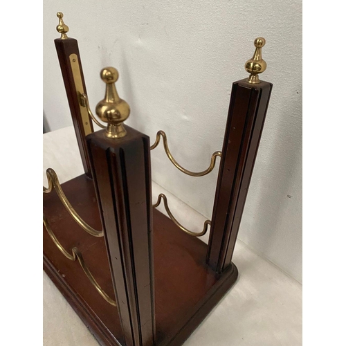 268 - A GOOD BRASS & MAHOGANY WINE RACK, with decorative gilt brass finials atop supports on mahogany rect... 