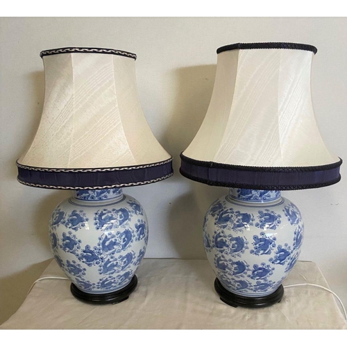 272 - A LARGE PAIR OF CHINESE GINGER JAR LAMPS, bulbous form with blue painted design depicting coy fish o... 