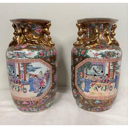 273 - A FINE PAIR OF CHINESE FAMILLE ROSE VASES, with moulded gilt decoration to neck of vase, decorated w... 