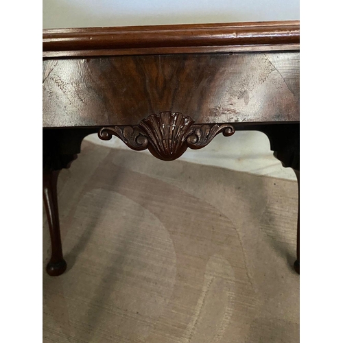 277 - AN IRISH WALNUT COFFEE TABLE/STOOL, upholstered to top, shell carving to frieze, with cabriole leg o... 