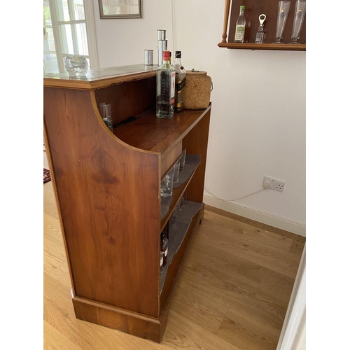 281 - A FANTASTIC SOLID TEAKWOOD BAR, ALONG WITH BARSTOOLS AND WALLSHELF, bar with fluted sides, panelled ... 