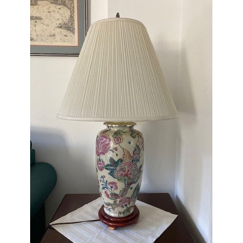 282 - A PAIR OF VINTAGE ORIENTAL CERAMIC TABLE LAMPS, finely decorated with painted floral design on cream... 