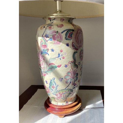 282 - A PAIR OF VINTAGE ORIENTAL CERAMIC TABLE LAMPS, finely decorated with painted floral design on cream... 