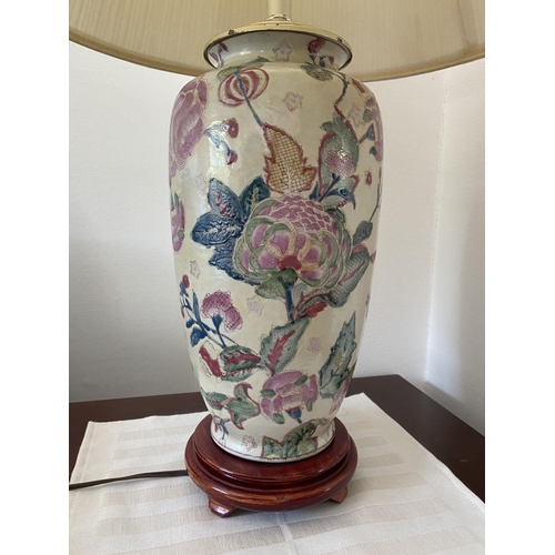 282 - A PAIR OF VINTAGE ORIENTAL CERAMIC TABLE LAMPS, finely decorated with painted floral design on cream... 