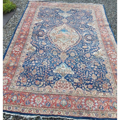 283 - A VERY FINE ANTIQUE PERSIAN RUG, with central cartouche motif depicting palace in landscape, surroun... 