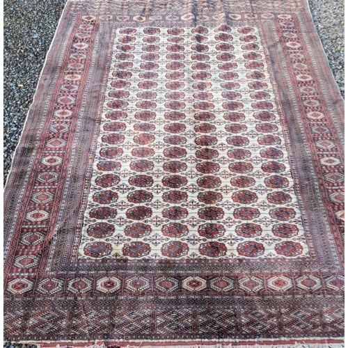 284 - AN EXCELLENT AUTHENTIC TURKOMAN RUG, with traditional design featuring repeat motif design to centre... 