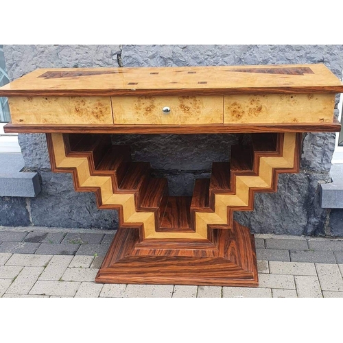 287 - A CONTEMPORARY MIXED WOOD HALL / CONSOLE TABLE, with single drawer to frieze, raised on dramatic ang... 