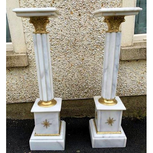 290 - A PAIR OF MARBLE COLUMN JARDINERE STANDS, with gilt scrolling foliage detail to the top and a star d... 