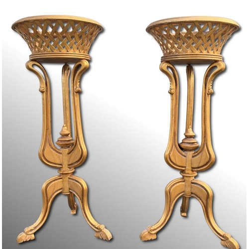 294 - A PAIR OF ORNATE GILT PLANT STAND HOLDERS, the circular basket style tops with lattice bodies are ra... 