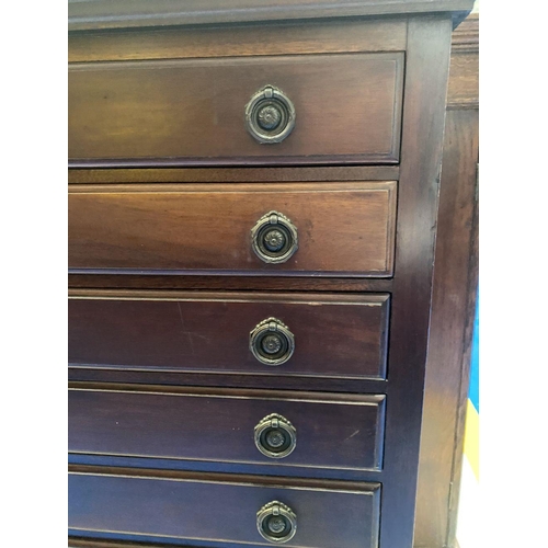 298 - A 19TH CENTURY MAHOGANY MUSIC CABINET, with upstand back, front opening drawers with brass handles a... 