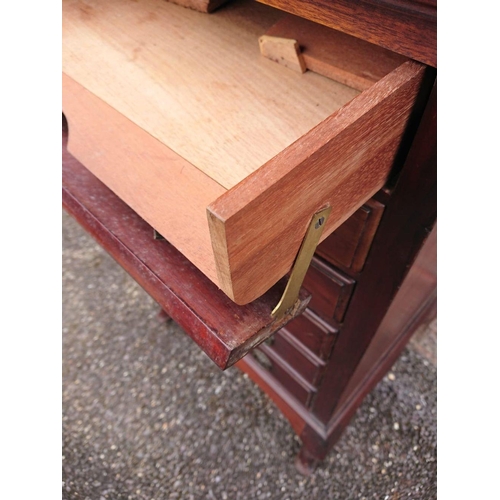 298 - A 19TH CENTURY MAHOGANY MUSIC CABINET, with upstand back, front opening drawers with brass handles a... 