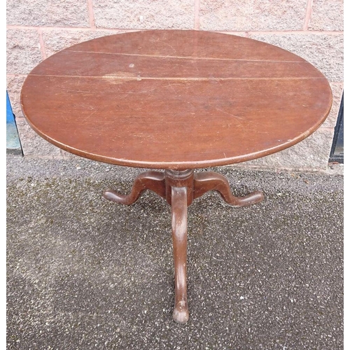 299 - A 19TH CENTURY MAHOGANY CIRCULAR FOLDING TABLE, on turned support with tripod base. Dimensions: 90cm... 