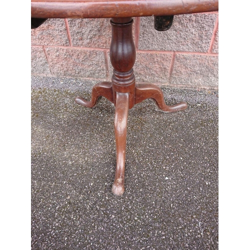 299 - A 19TH CENTURY MAHOGANY CIRCULAR FOLDING TABLE, on turned support with tripod base. Dimensions: 90cm... 