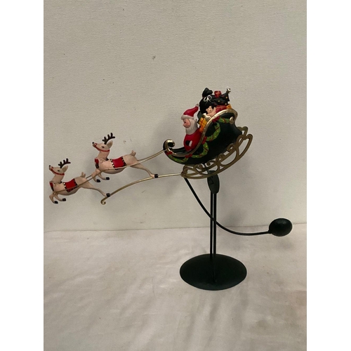 300 - A CHARMING CHRISTMAS PENDULIM, on circular platform base with Santa in sleigh and two reindeers. Dim... 