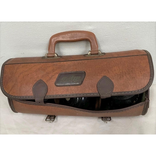 302 - A LEATHER CASE WITH BOCCE BALL GAME TO INTERIOR, case with handle, clasps, three compartments to int... 