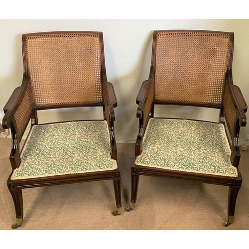 307 - A GOOD QUALITY PAIR OF MAHOGANY FRAMED BERGERE ARMCHAIRS, having shaped backs and arms with bergere ... 