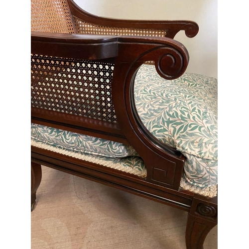 307 - A GOOD QUALITY PAIR OF MAHOGANY FRAMED BERGERE ARMCHAIRS, having shaped backs and arms with bergere ... 