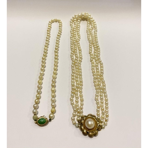 312 - TWO LOVELY PEARL NECKLACES, (i) one strand with 14ct gold clasp with green enamel to centre, (ii) a ... 