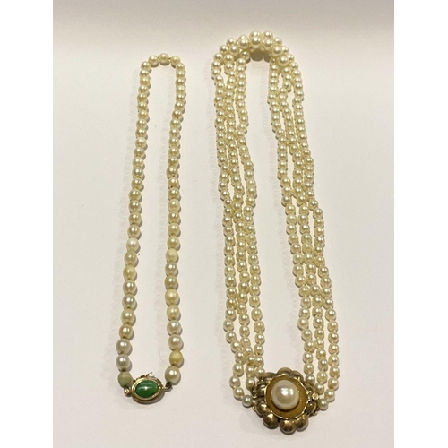 312 - TWO LOVELY PEARL NECKLACES, (i) one strand with 14ct gold clasp with green enamel to centre, (ii) a ... 