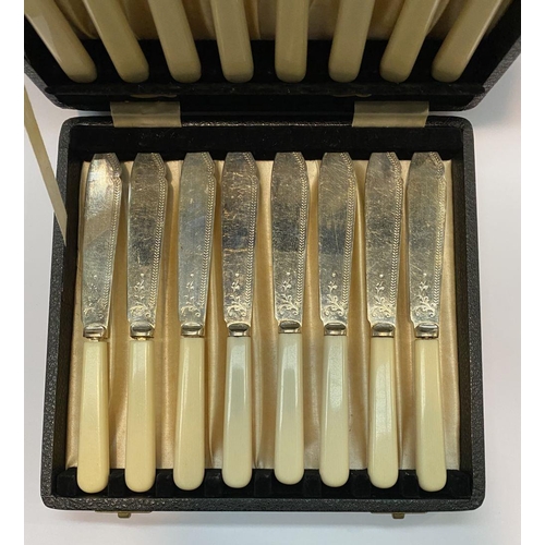 316 - A CASED SET OF DECORATIVE FISH KNIVES AND FORKS, with resin handles, engraved with decorative design... 