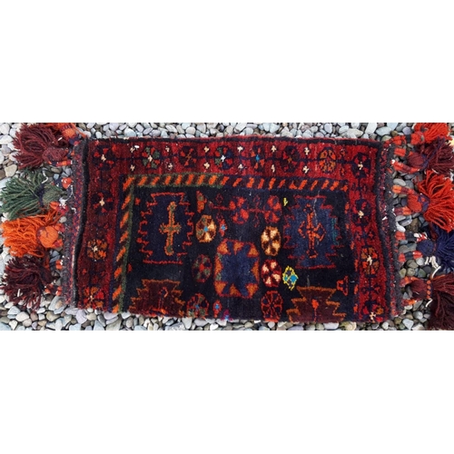 324 - A VIBRANT TURKOMAN CUSHION CASE, with medallion design to centre surrounded by floral patterned bord... 