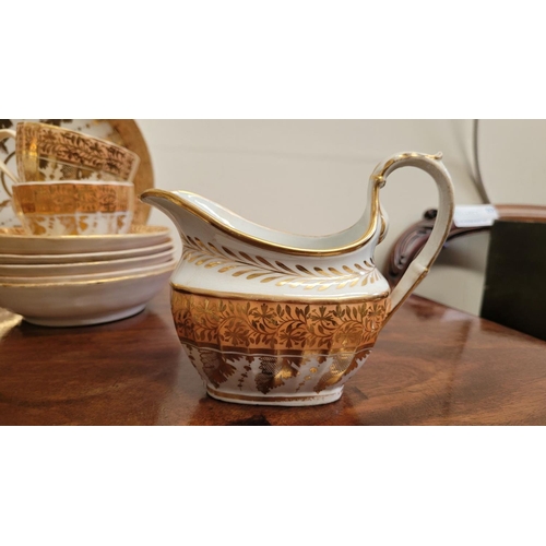 330 - A VINTAGE PARTIAL TEA/COFFEE SET, with gold & salmon coloured palette, comes with; 2 deep plates, 12... 