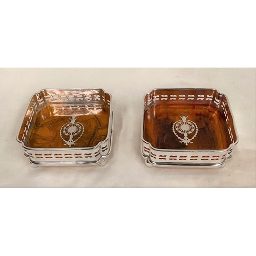 34 - A PAIR OF SILVER PLATED SQUARE SHAPED WINE COASTERS, with inlaid tortoiseshell base, pierced design ... 