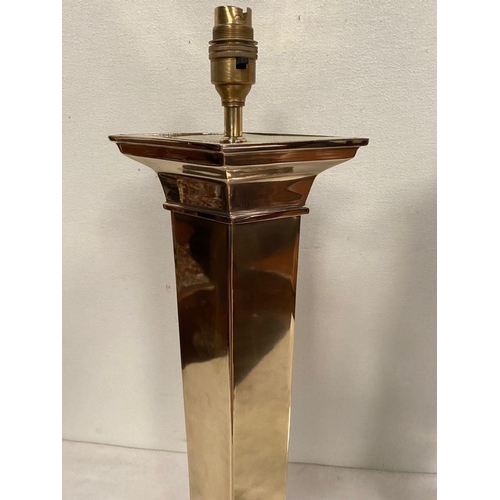 35 - A FINE PAIR OF POLISHED BRASS TABLE LAMPS, column form on square platform base with four lion paw fe... 