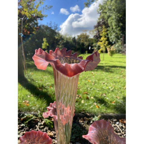 39 - AN EXCELLENT VICTORIAN RUBY GLASS EPERGNE, with scrolling silver plated base supporting three horns ... 