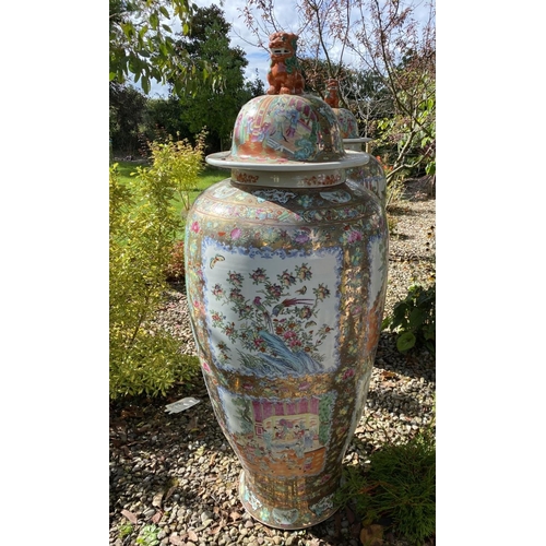 4 - AN EXCEPTIONAL PAIR OF LARGE FAMILLE ROSE CHINESE URN/PALACE VASES, finely decorated with painted fi... 