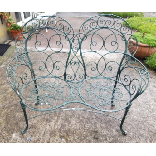 40 - A FRENCH MID CENTURY TWO SEATER GARDEN BENCH, finely decorated wrought iron with scrollwork design, ... 