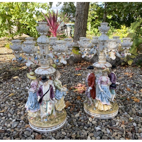 42 - A PAIR OF GERMAN MEISSEN STYLE PORCELAIN CANDLEABRA, each with seven branches with gilt painted deco... 