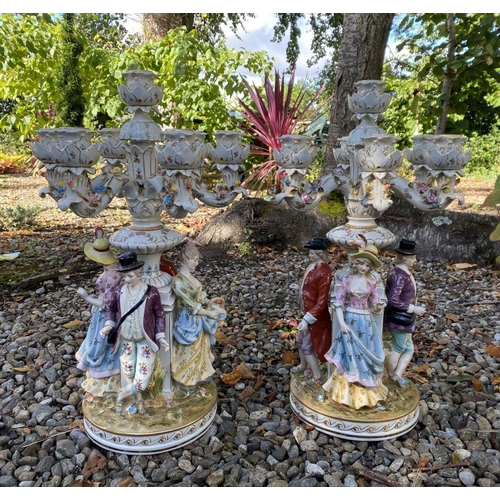 42 - A PAIR OF GERMAN MEISSEN STYLE PORCELAIN CANDLEABRA, each with seven branches with gilt painted deco... 