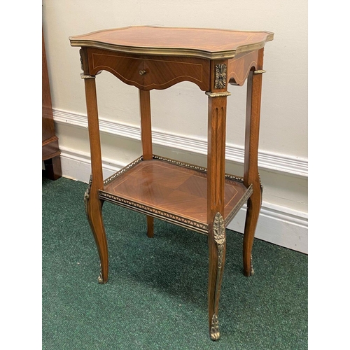 43 - A GOOD REGENCY STYLE ROSEWOOD SIDE TABLE, with wonderful inlay detail to shaped top and galleried un... 