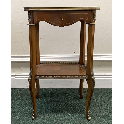 43 - A GOOD REGENCY STYLE ROSEWOOD SIDE TABLE, with wonderful inlay detail to shaped top and galleried un... 